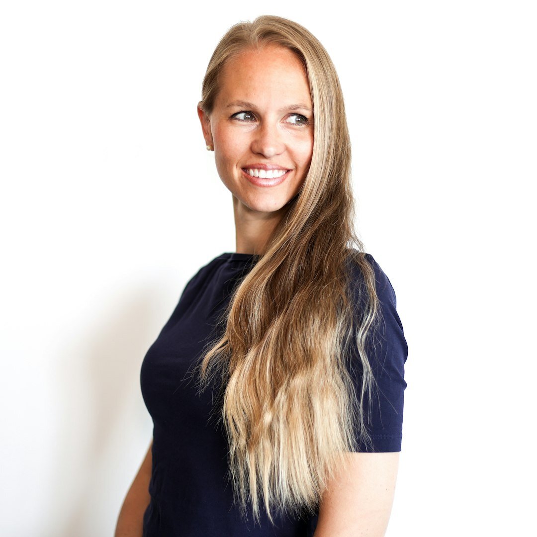 Professional female on-camera coach headshot