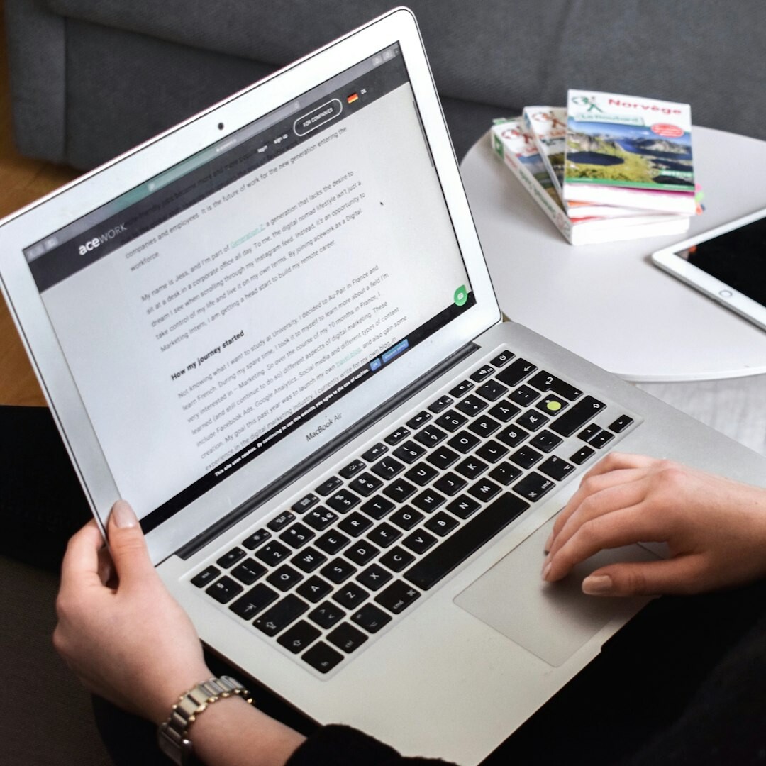 Journalist scripting a narrative report at a computer