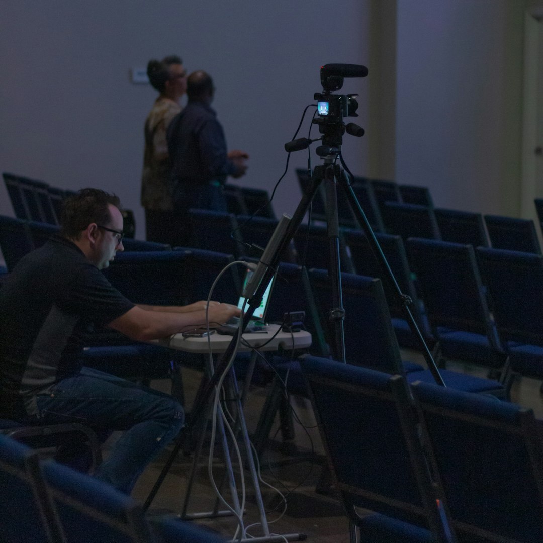 Person in front of camera doing on-screen performance training